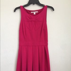 Cute darkish pink dress.